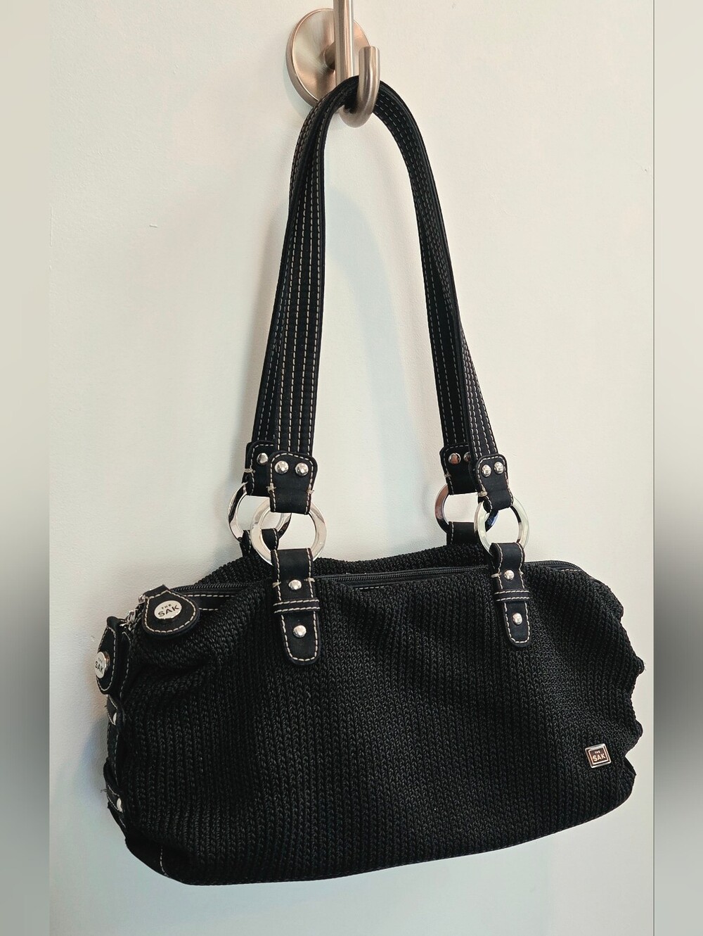 The Sak Black Crochet Barrel Shoulder Bag with Silver Hardware